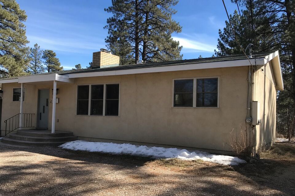 Stucco home exterior typical of Los Alamos, New Mexico